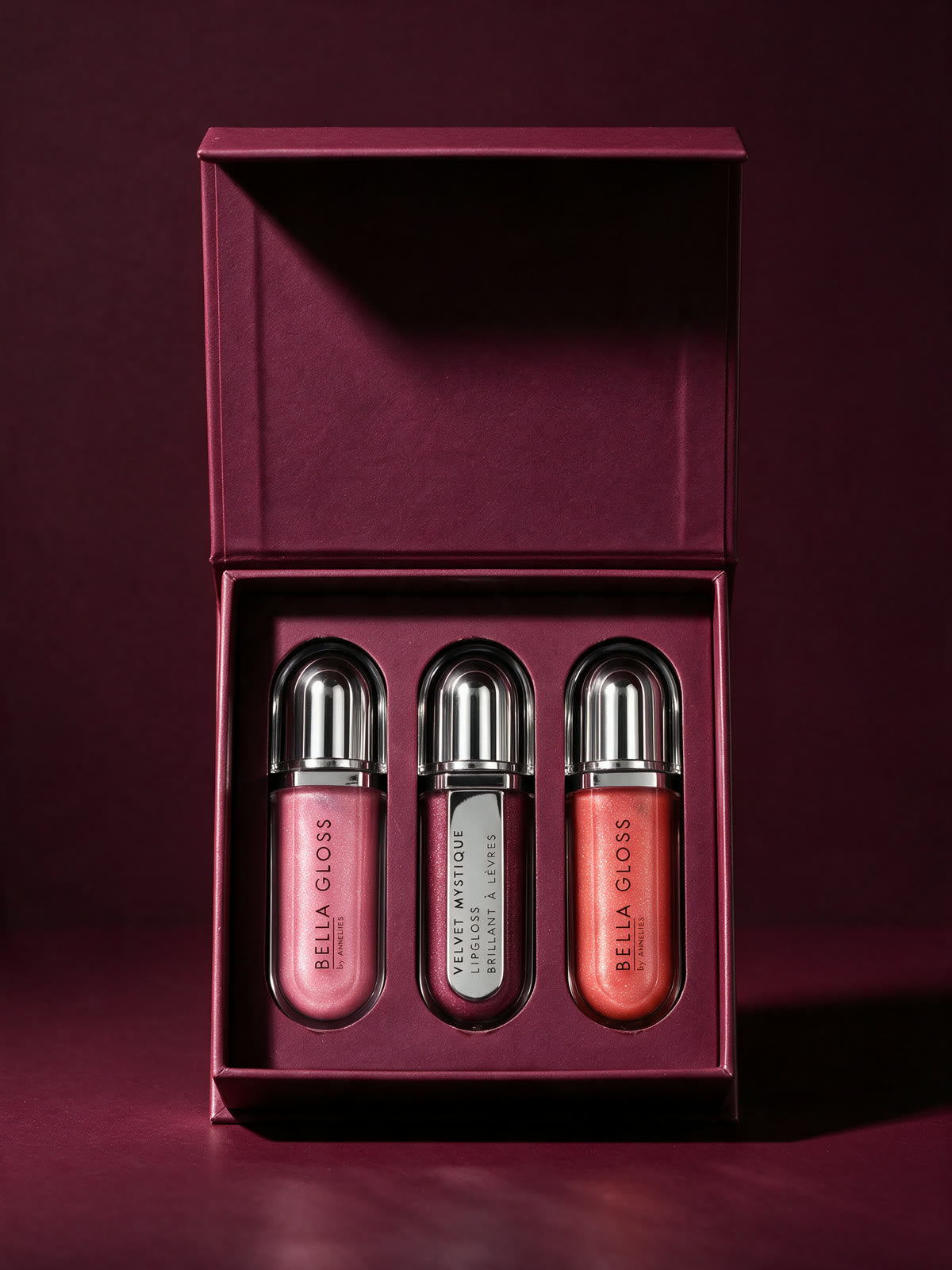 The Bella Gloss Set in the open gift box, with the three shades side by side